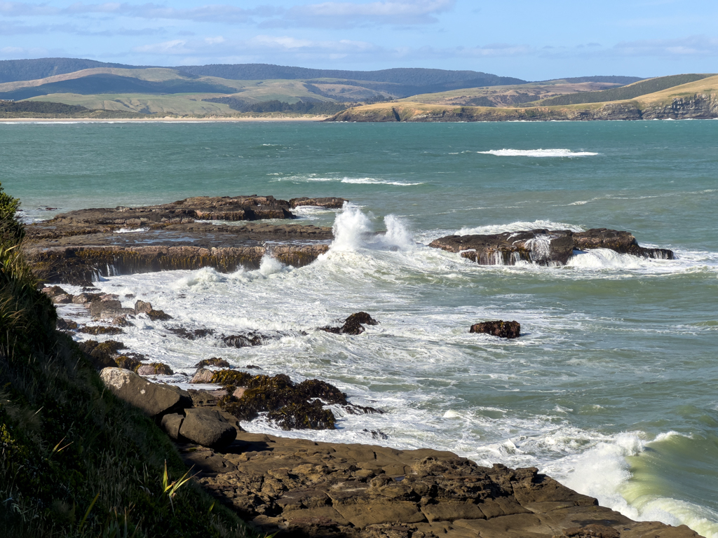 Die Flut kommt in die Curio Bay
