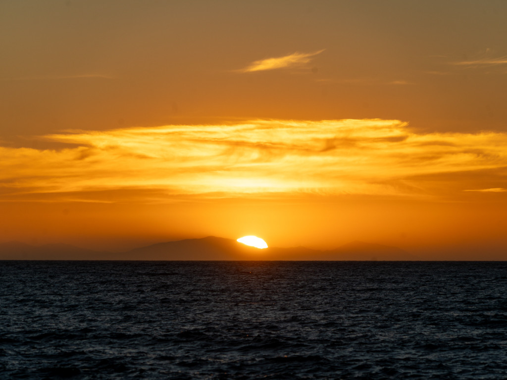 Sonnernuntergang an der Palliser Bay hinter den Bergen der Südinsel