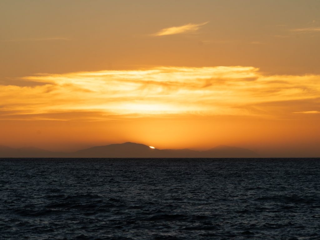 Sonnernuntergang an der Palliser Bay hinter den Bergen der Südinsel
