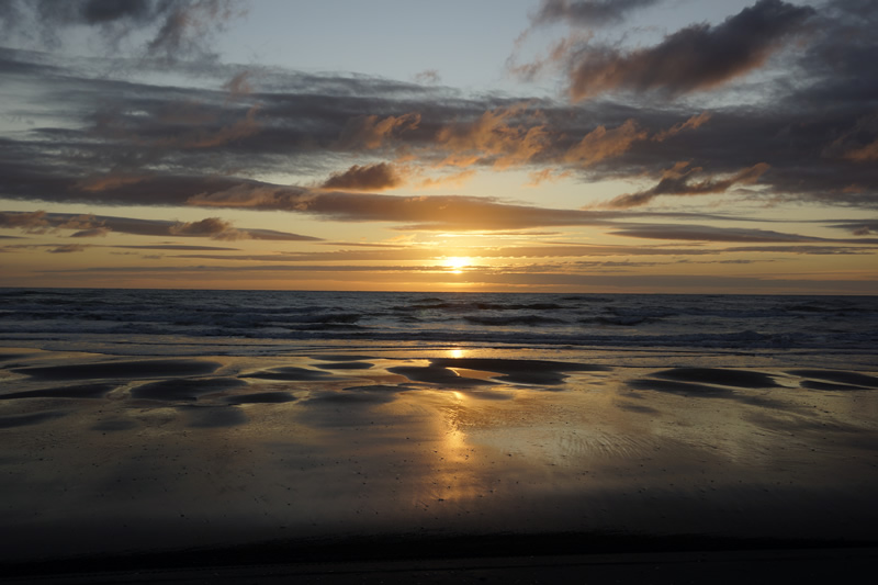 Sonnenuntergand Whanganui, Castlecliff Beach