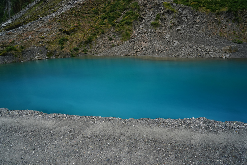 Türkisblauer kleiner See beim Fox Glacier