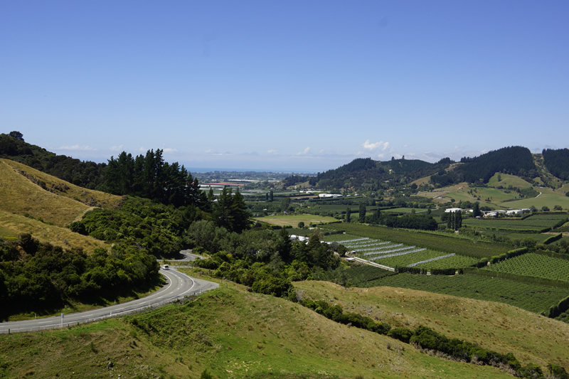 Takaka Hill Pass, Blick zurück ins fruchtbare Tal bei Motueka