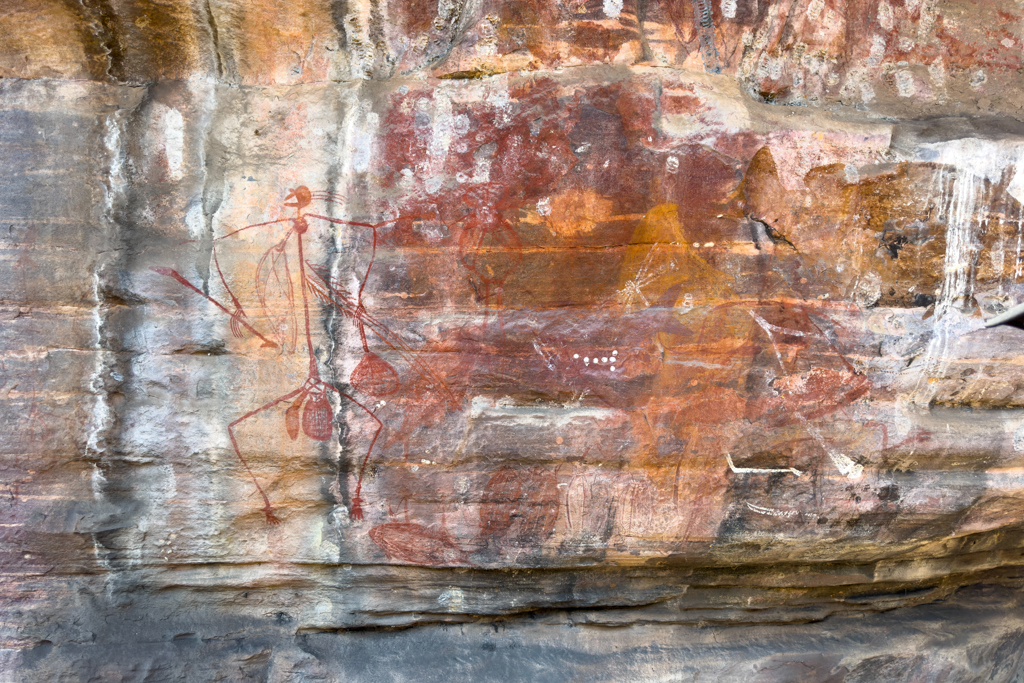 Felsmalereien am Nourlangie Art Rock. Jemand hat einen Fisch gestohlen und wurde von Mabuyu später bestraft und wurde dafür b