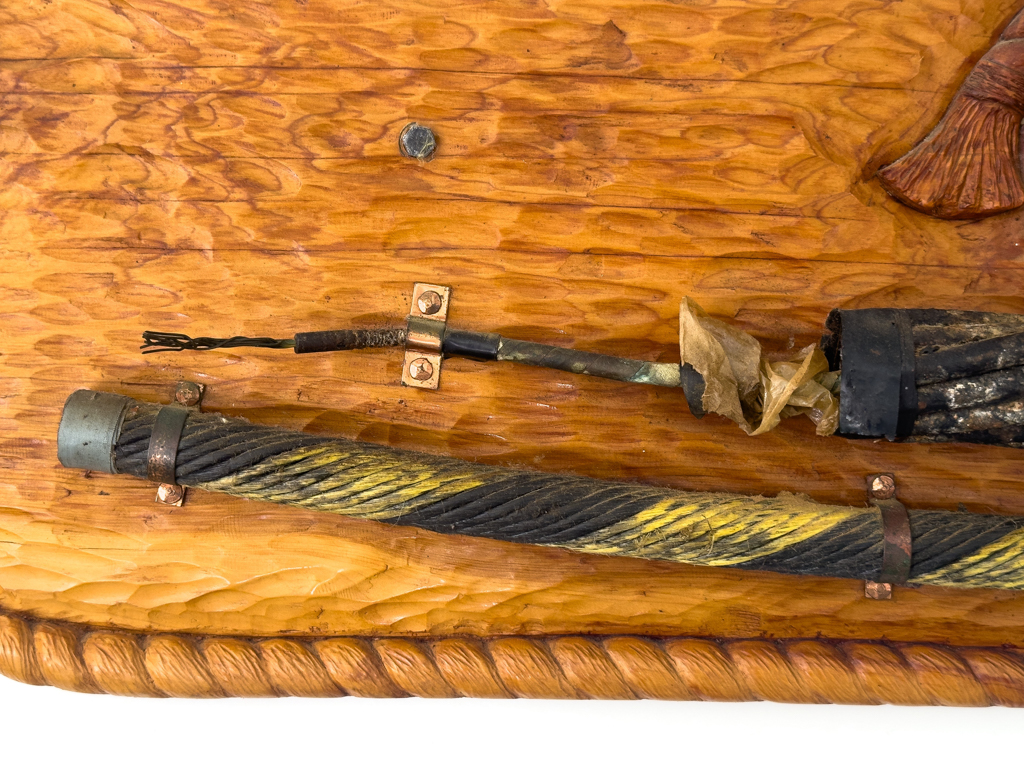 Ein Stück Original-Unterseekabel, das der Cable Bay ihren Namen gab